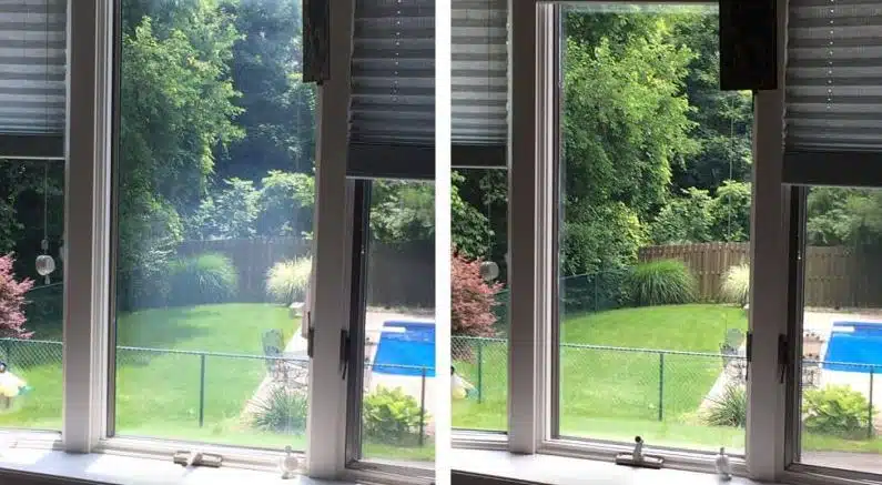 Hantverkare som byter fönsterglas för att energieffektivisera ett gammalt fönster.